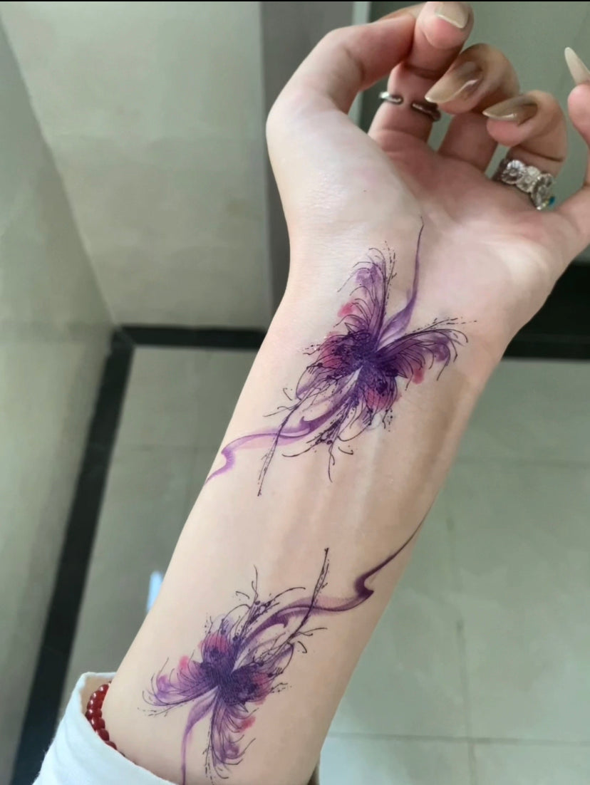 Temporary tattoo of purple butterfly flower