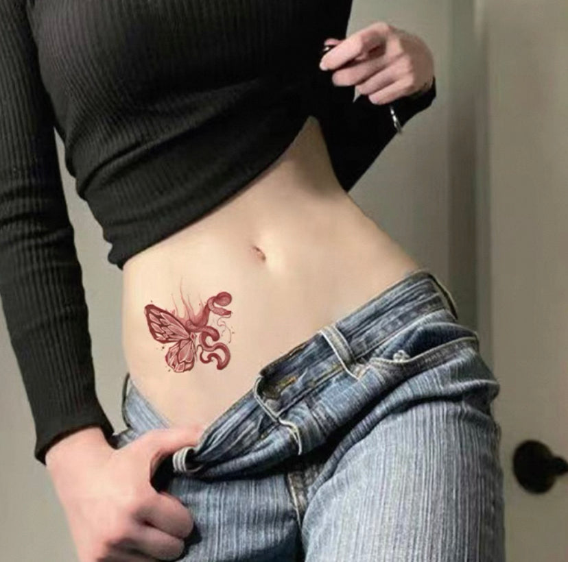 Temporary tattoos of snakes and butterflies