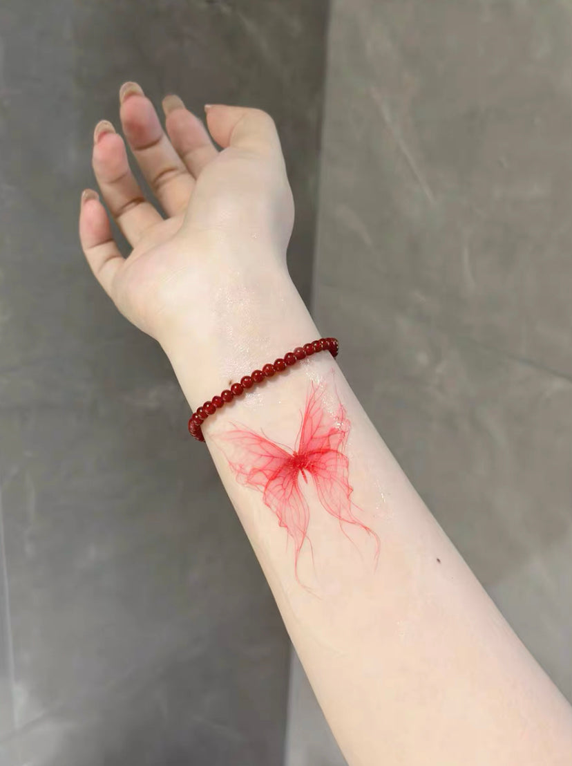 Red butterfly tattoo sticker